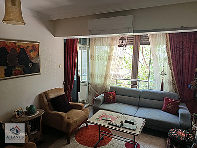 KARŞIYAKA YALI'DA MÜKEMMEL KONUMDA, BAKIMLI ÇİFT CEPHE 2+1 DAİRE
